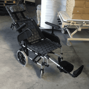 Black Flower Pattern Comfort Evolution Recliner Pushchair / Wheelchair - Asian Integrated Medical Sdn Bhd (ielder.asia)