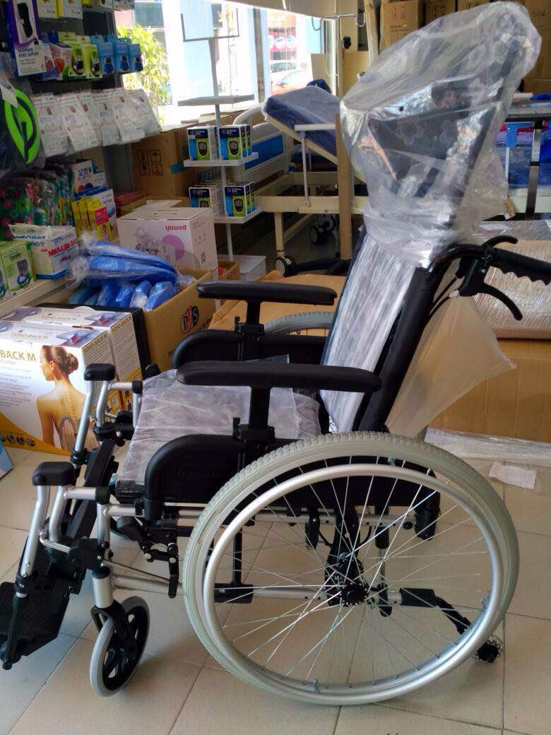 Black Flower Pattern Comfort Evolution Recliner Pushchair / Wheelchair - Asian Integrated Medical Sdn Bhd (ielder.asia)